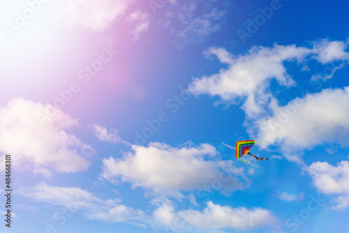 Tela Kite flying in the sky among the clouds