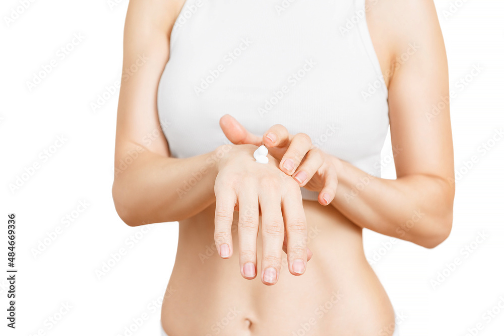 Woman applying cream, female hands, white, closeup. Woman applying cream, female hands, white, closeup.
