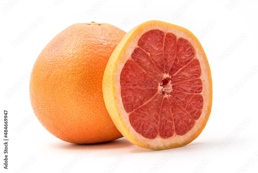 Isolated red grapefruits. Whole red grapefruit and slice of fresh grapefruit isolated on white background with clipping path Isolated red grapefruits. Whole red grapefruit and slice of fresh grapefruit isolated on white background with clipping path