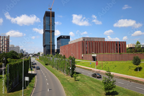 View to Walentego Rozdzienskiego Alley on the height of the footbridge. Cityscape, KTW office buildings and Katowice Cultural Zone on the right. Horizontal image. Silesia, Poland photo