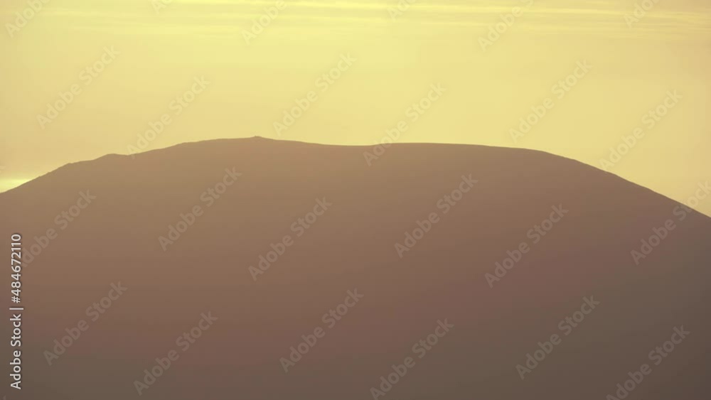 North Wales mountain background of a rounded hill at sunrise North Wales mountain background of a rounded hill at sunrise