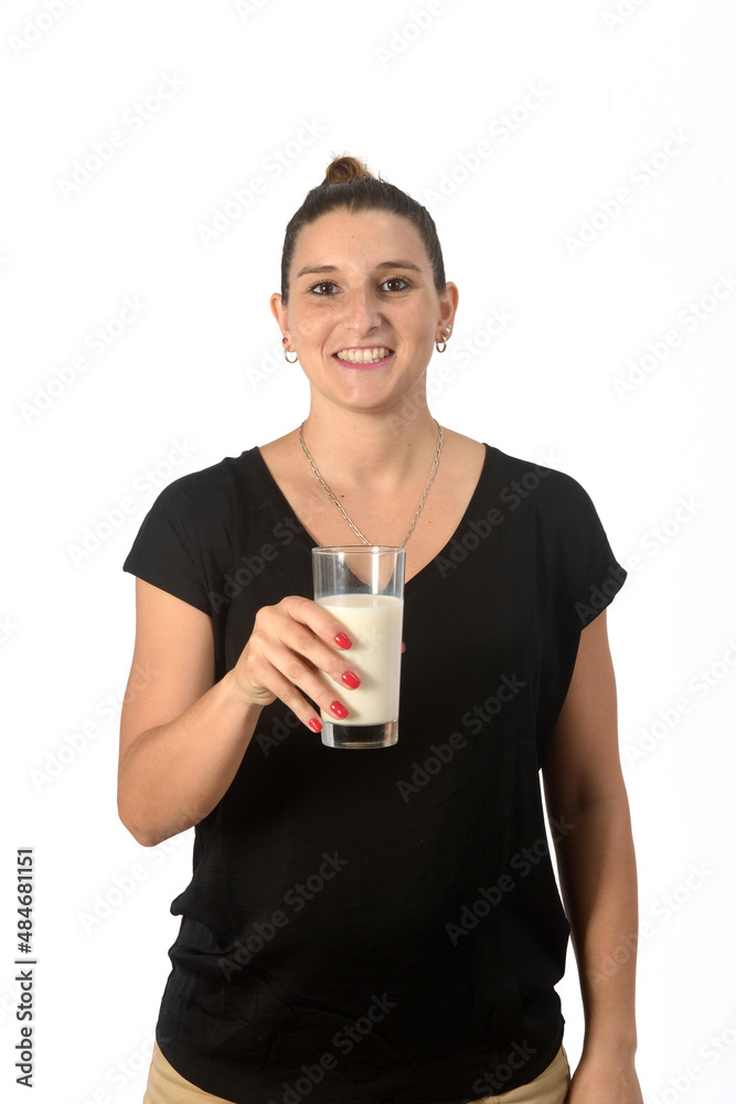 woman holding glass of milk on white background woman holding glass of milk on white background