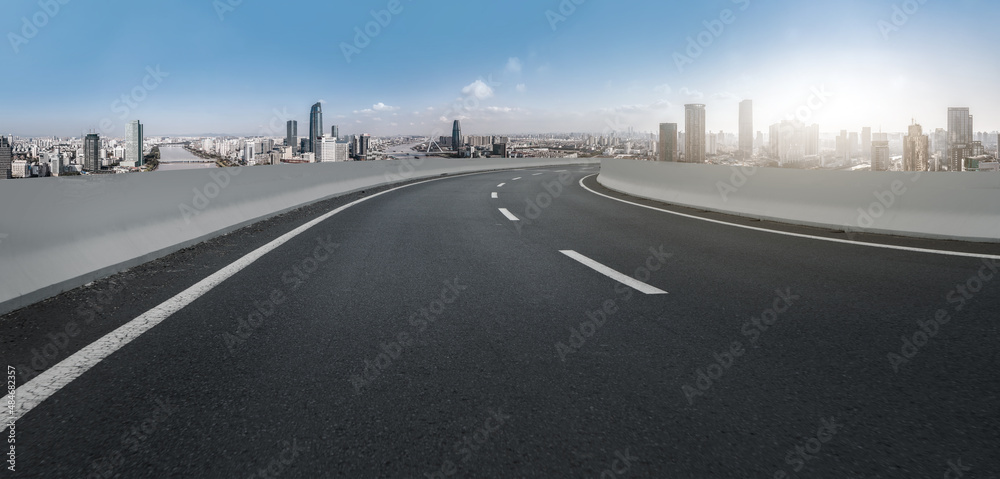Fototapeta premium Freeway skyline and financial district modern buildings