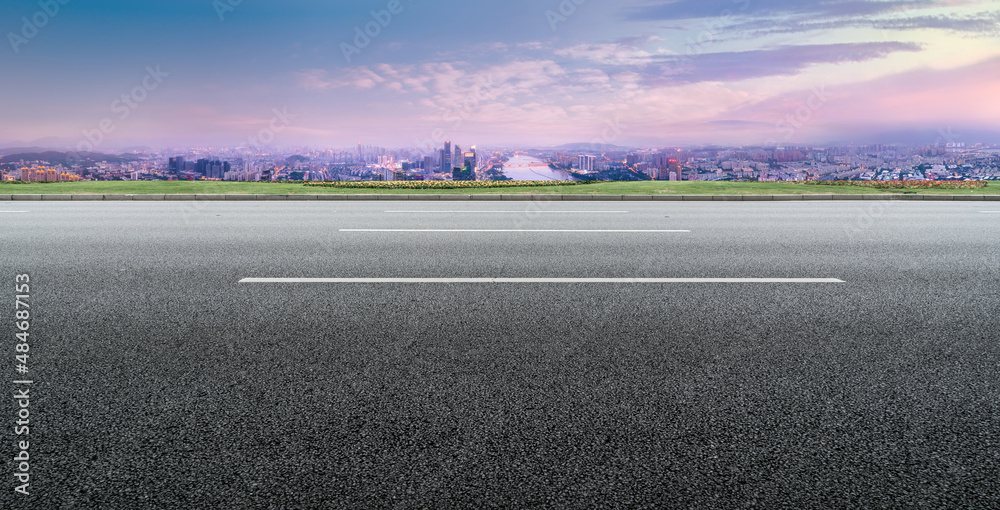 Fototapeta premium Freeway skyline and financial district modern buildings