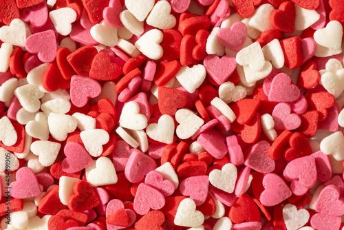 red white pink hearts background, valentine's day concept, pastry sprinkle