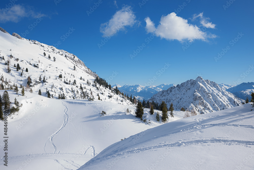 beautiful winter landscape in skiing and hiking area rofan mountains, austria. with some snow tracks