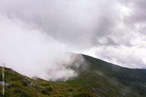 Clouds and mountain peak