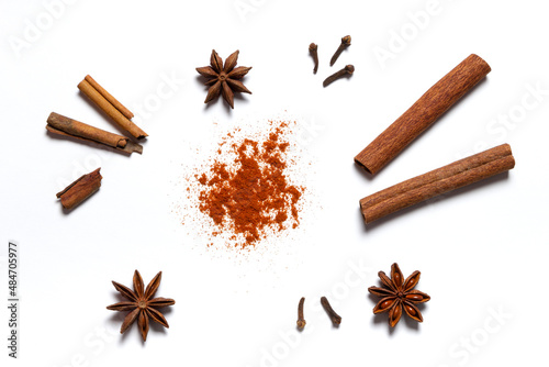 Spices anise, clove, paprika, cinnamon on white background.
