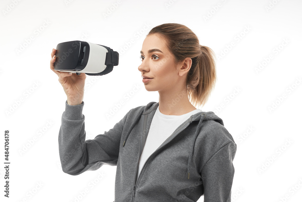 Woman with VR headset in studio Woman with VR headset in studio