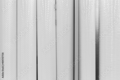 White wallpaper objects in rolls material for interior design and decoration of the house, close-up