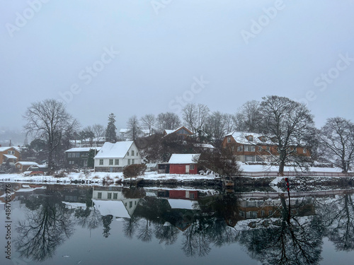 Obraz na płótnie landscape with houses winter ocean or lake in fiordo Norway w salonie