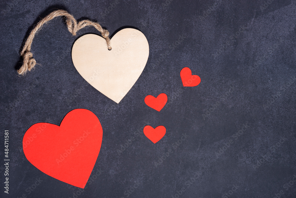 Hearts on dark textured background Hearts on dark textured background