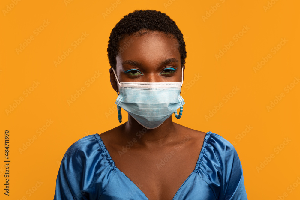 Portrait of short-haired black woman in face mask Portrait of short-haired black woman in face mask