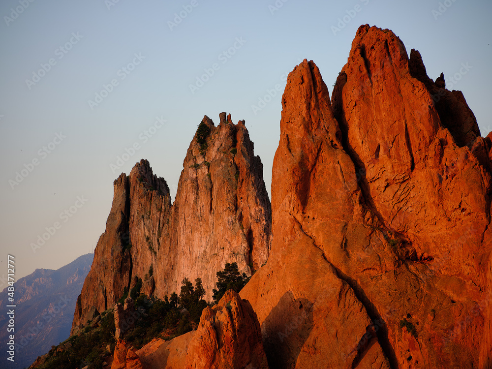 Red and orange patterns in the sandstone cliffs in late afternoon light in Garden of the Gods Colorado Springs