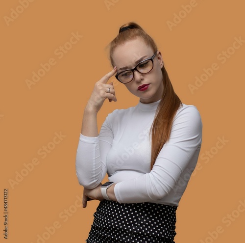 a teacher girl with a positive smile and long hair poses with papers