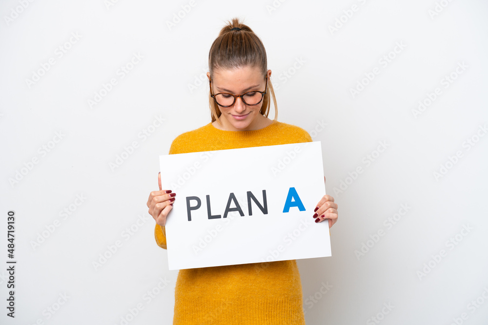 Young caucasian woman isolated on white background holding a placard with the message PLAN A Young caucasian woman isolated on white background holding a placard with the message PLAN A