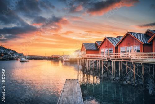 Red rorbu on wooden piles o...