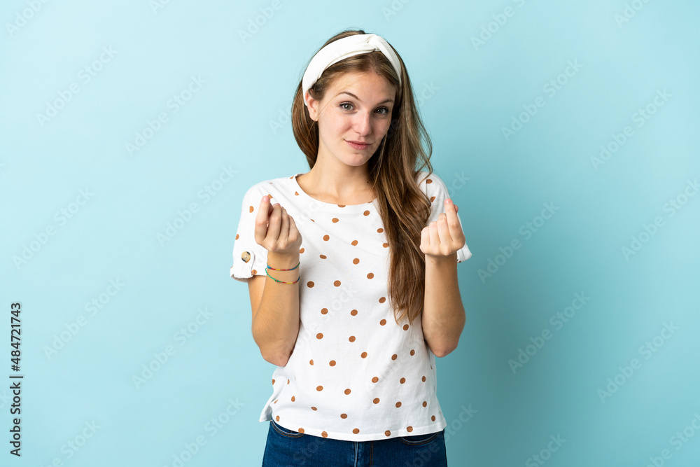 Young caucasian woman over isolated background making money gesture but is ruined Young caucasian woman over isolated background making money gesture but is ruined