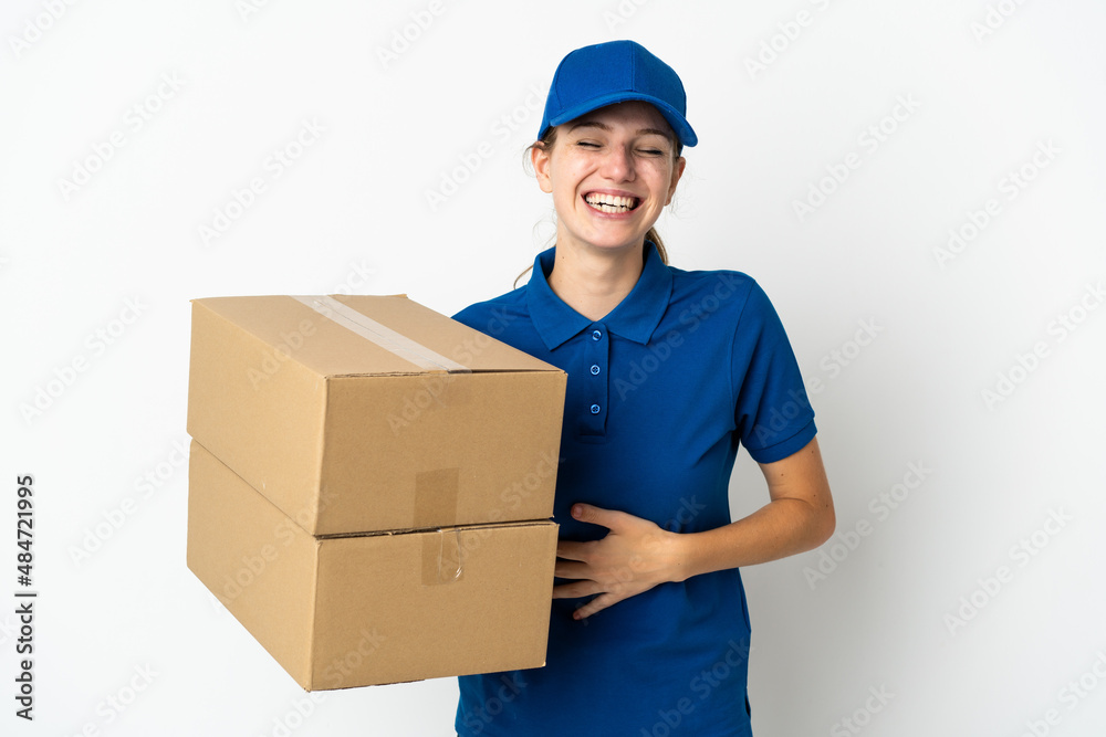 Young delivery woman isolated on white background smiling a lot Young delivery woman isolated on white background smiling a lot