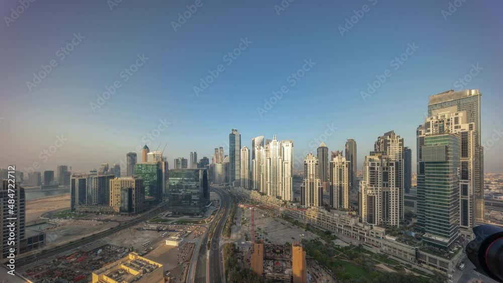 Panorama of Bay Avenue with modern towers residential development in Business Bay aerial all day timelapse Panorama of Bay Avenue with modern towers residential development in Business Bay aerial all day timelapse