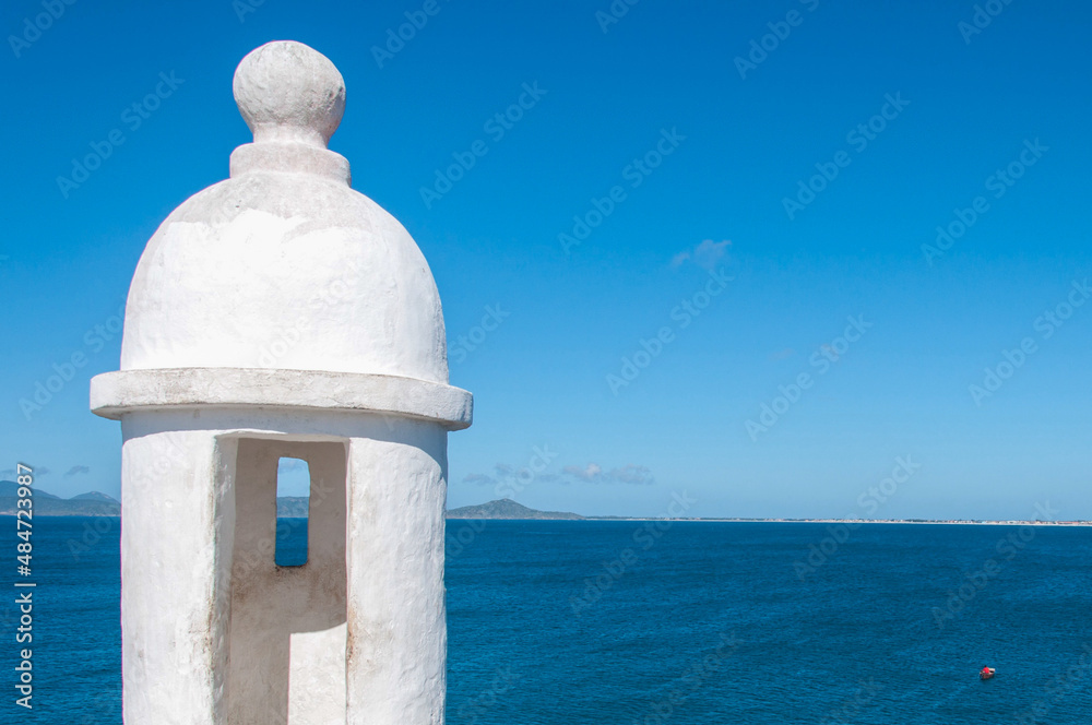 Fort observation tower against a backdrop of blue sea and sky Fort observation tower against a backdrop of blue sea and sky