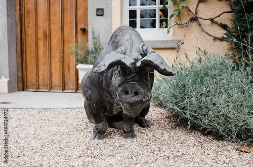 statue of a large pig outside a country home in England photo