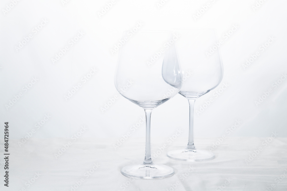Wine and champagne glasses on a white background.