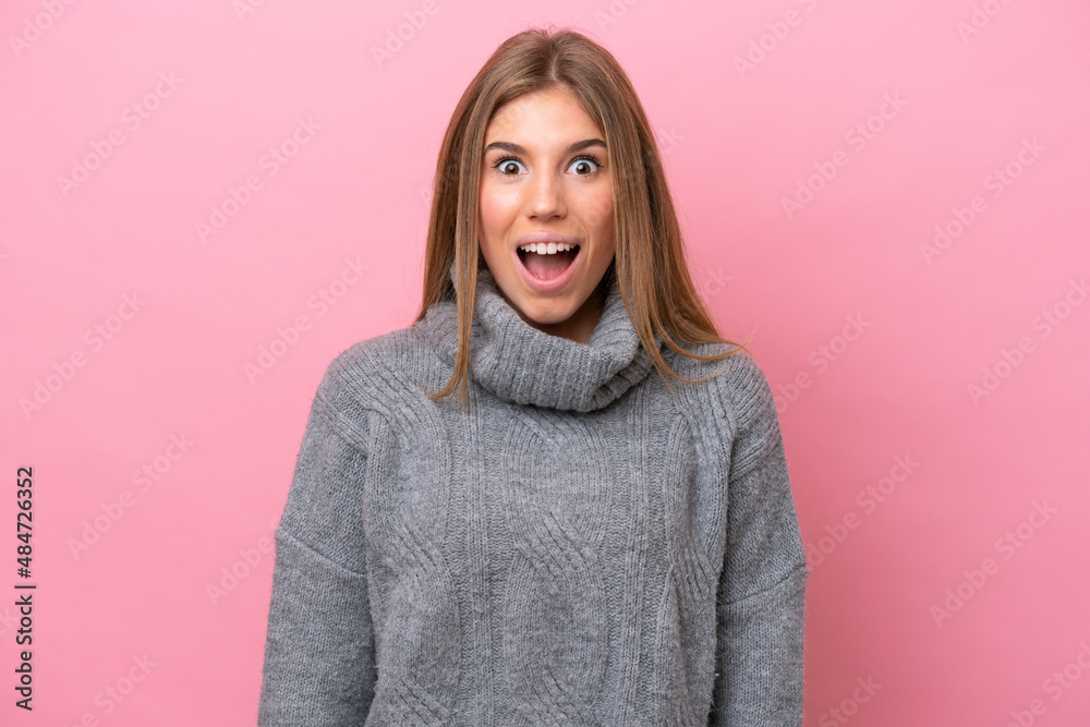 Young caucasian woman isolated on pink bakcground with surprise facial expression Young caucasian woman isolated on pink bakcground with surprise facial expression