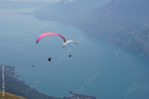 Paragliding over Malcesnie town on Lake Garda