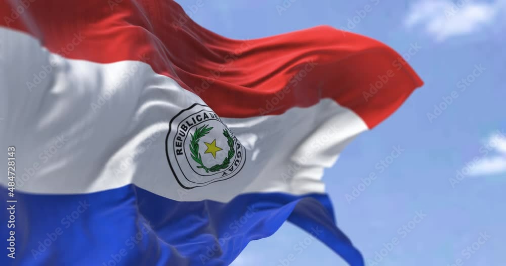 Detail of the national flag of Paraguay waving in the wind on a clear day