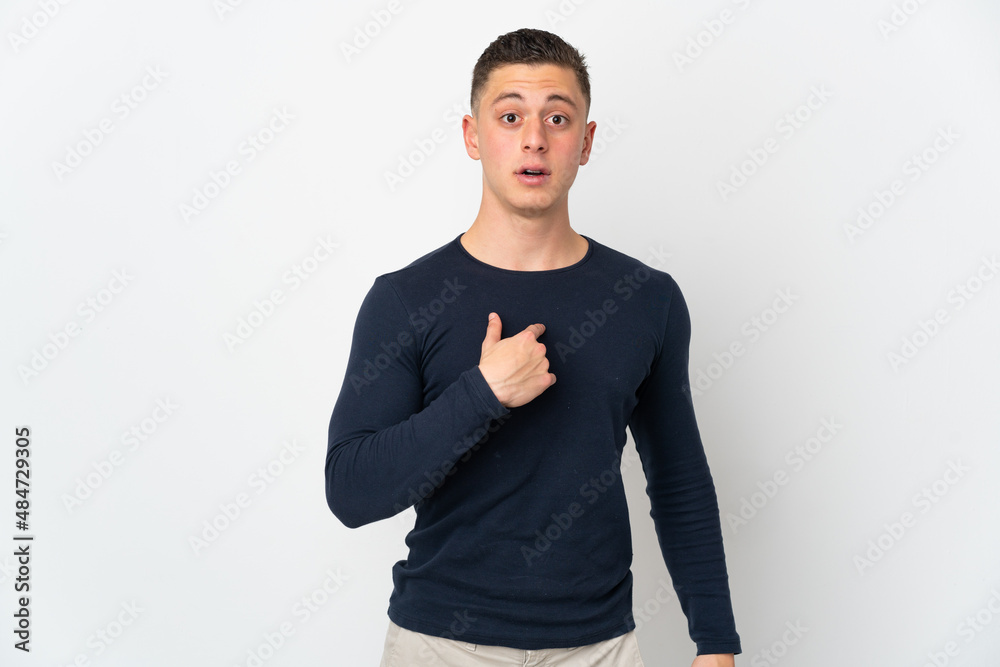 Young caucasian man isolated on white background pointing to oneself Young caucasian man isolated on white background pointing to oneself