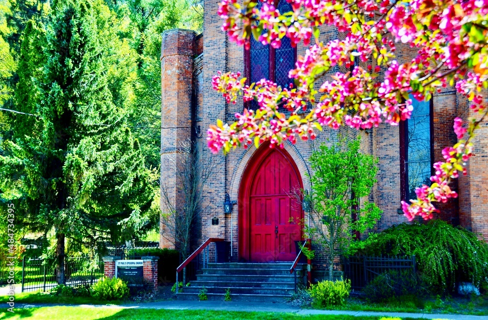Old church building with elegant red door. The St Paul's Episcopal
