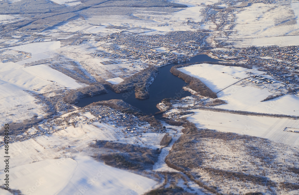 Aerial view of Hlynna Navaria lake near Lviv, Ukraine in winter. Pond also known as Shchyrets Reservoir or Glynna-Navaria.
