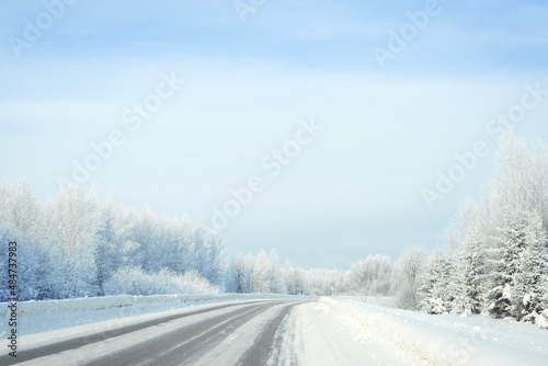 winter landscape snowy trees blue sky © shapovalphoto