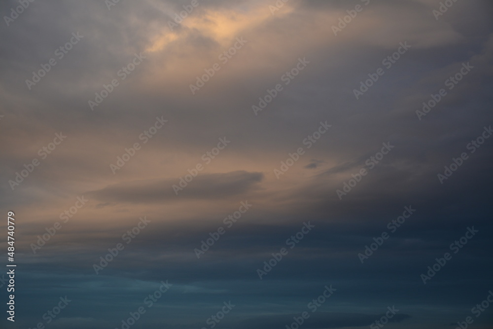 Beautiful morning cloudy sky with a blue tint. Sunrise in the clouds Beautiful morning cloudy sky with a blue tint. Sunrise in the clouds