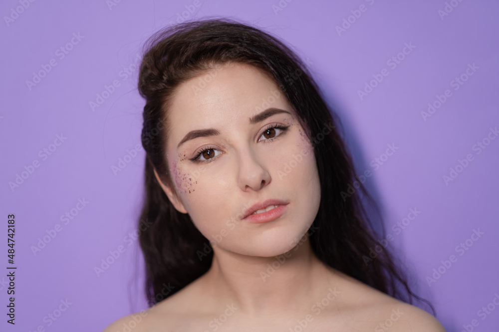 Fototapeta premium pretty brunette girl woman on Very Peri background. trendy color 2022. light purple.