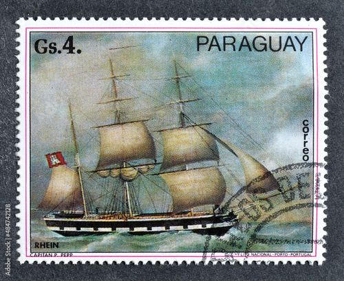 Cancelled postage stamp printed by Paraguay, that shows Painting of sailing ship by P.Pepp, circa 1977.  photo