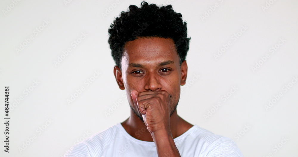 Thoughtful person having an idea thinking deeply about solution. Concentrated black African portrait