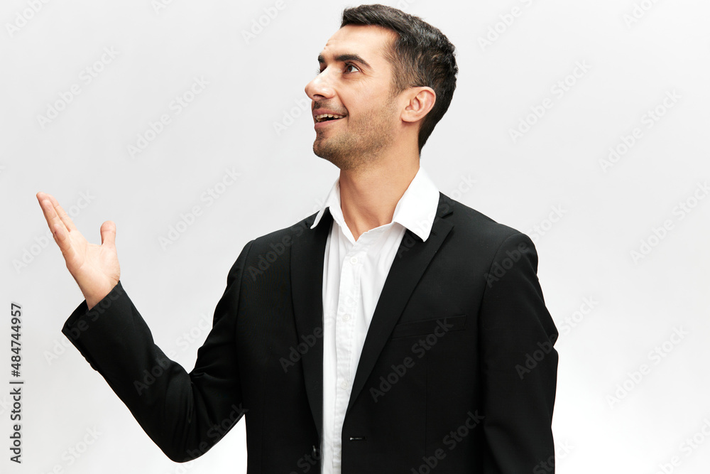 handsome man in a modern suit emotion self-confidence official isolated background handsome man in a modern suit emotion self-confidence official isolated background