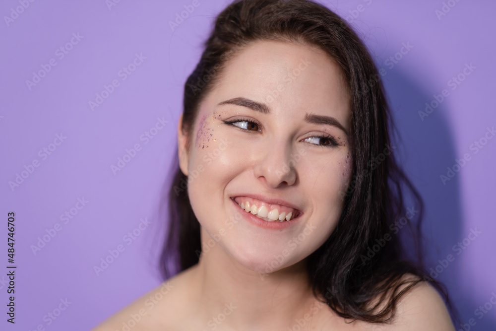 beautiful young brunette girl woman on Very Peri background. trendy color 2022. light purple. violet. beautiful young brunette girl woman on Very Peri background. trendy color 2022. light purple. violet.