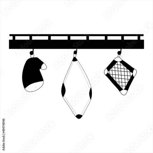 Shelf with kitchen towels mitt and potholder