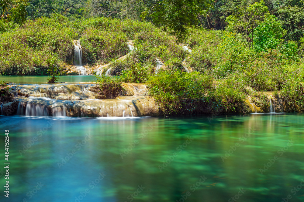 Obraz premium Semuc Champey cascades along the Cahabon river with long exposure, Peten rainforest, Lanquin, Guatemala.