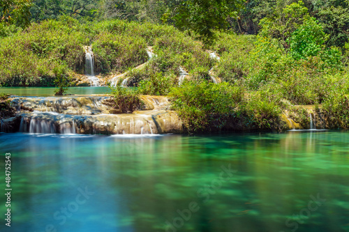 Semuc Champey cascades along the Cahabon river with long exposure, Peten rainforest, Lanquin, Guatemala. photo