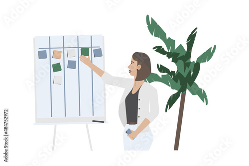 Scrum master. Strategy planning. Team Building. Young woman near scrum task board in office.