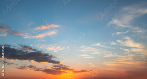 Fototapeta Naklejka Na Ścianę i Meble -  Fantastic bright clouds in the sunset sky. 
Sky background.