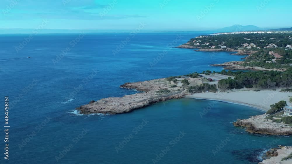 Playa y Castillo de Sant Jordi d'Alfama en l'Ametlla de Mar Tarragona Spain Playa y Castillo de Sant Jordi d'Alfama en l'Ametlla de Mar Tarragona Spain