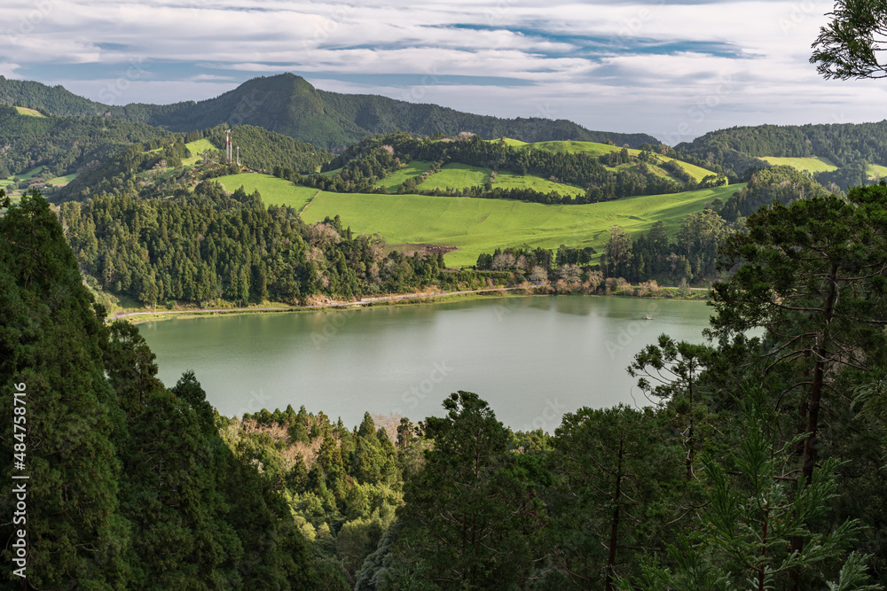 The crater lake Lagoa das Furnas in the homonym volcanic caldera in Sao Miguel island (Azores, Portugal) The crater lake Lagoa das Furnas in the homonym volcanic caldera in Sao Miguel island (Azores, Portugal)