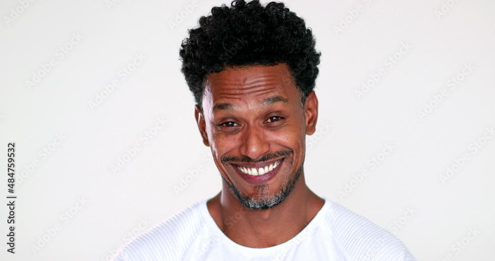African man changing moods from surprised to relief smiling African man changing moods from surprised to relief smiling