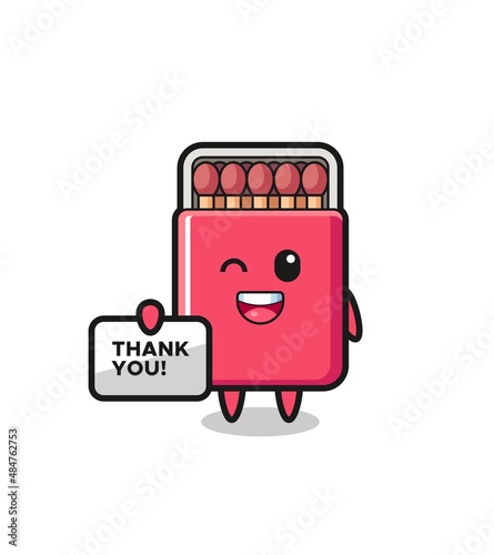 the mascot of the matches box holding a banner that says thank you