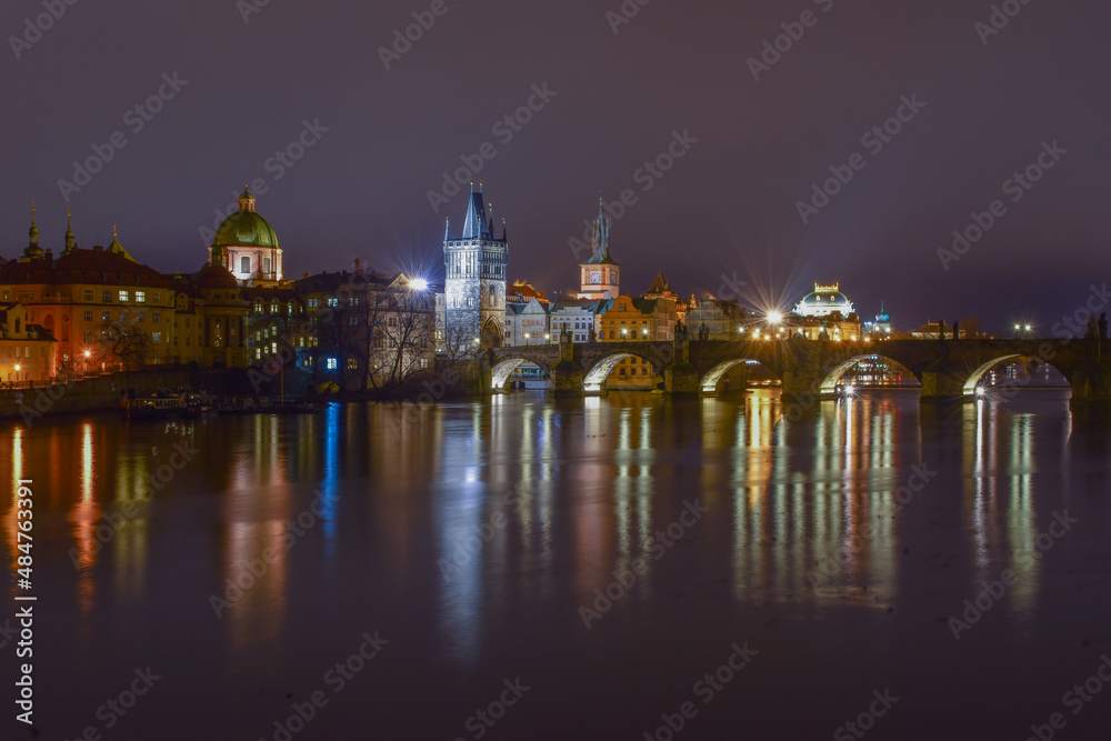 City landscape at night, bridge over the river